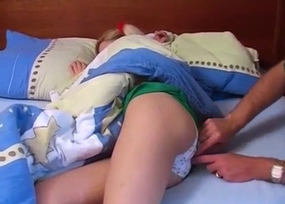 Bald-headed dude happily molests his sleeping daughter